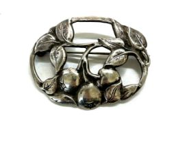 Bernard Instone arts and crafts silver brooch circa 1920, modelled in relief with fruit,