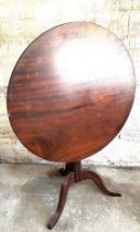 Mahogany antique tilt top table,approximate measurements: Diameter 29 inches, Height 28 inches