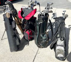 Selection of 5 golf bags with various golf clubs to include Dunlop, Pro Shot, Williams etc