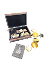 Six vintage powder compacts and a tin of vintage and later costume jewellery