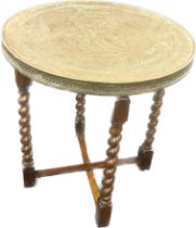 Barley twist folding brass topped table measures approximately 24 inches tall 24 inches diameter