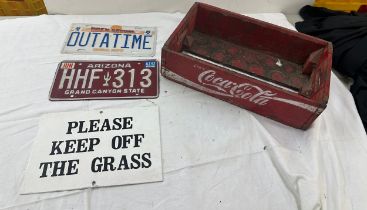 Vintage wooden coca cola crate with 2 american number plate and a please keep off the grass sign