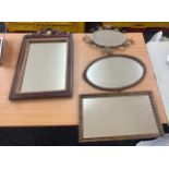 Selection of 4 mirrors largest measures approximately 26 inches by 17 inches wide