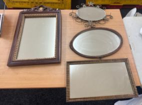 Selection of 4 mirrors largest measures approximately 26 inches by 17 inches wide