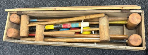 Wooden cased Croquet garden game, has sustained woodworm, case measurements: Length 42 inches,