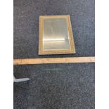Large bevelled edge gilt framed mirror, measures approximately 25 inches wide 35 inches tall