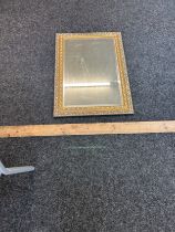 Large bevelled edge gilt framed mirror, measures approximately 25 inches wide 35 inches tall