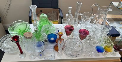 Large selection of assorted glassware to include coloured glass pieces, jugs, glasses, bowl etc