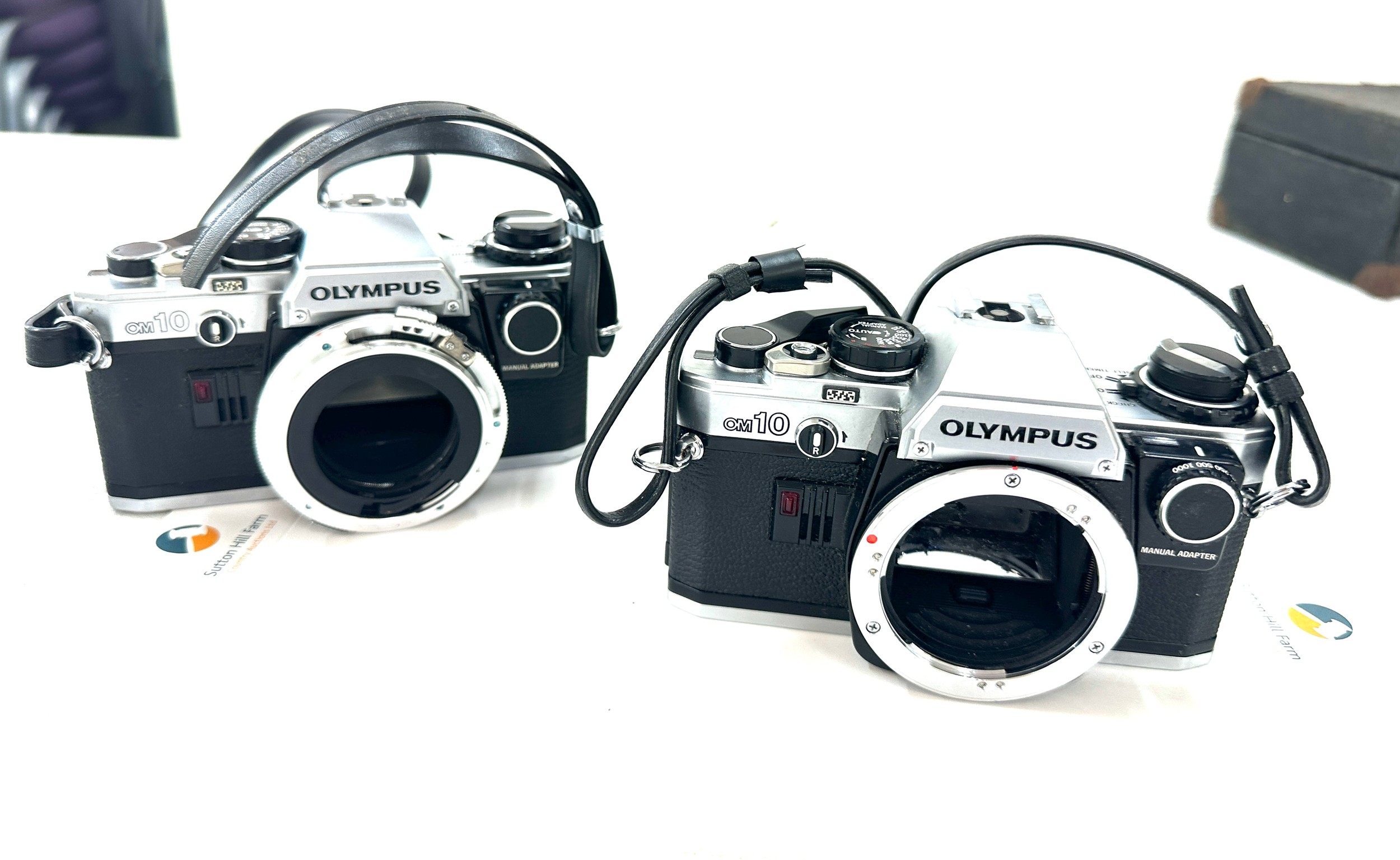 2 x olympus OM10 camera's, body only, no lens, untested