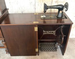 Cased Singer treadle sewing machine, untested