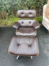 Eames replica lounge chair and footstool, one button missing and one loose