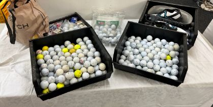 Selection of golfing balls, shoes, accessories