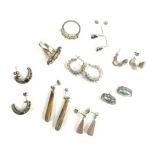 Selection of silver jewellery includes rings, abalone etc
