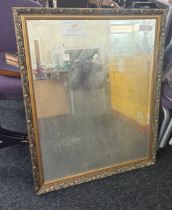 Large gilt framed mirror measures approximately 45 inches tall 34 inches wide