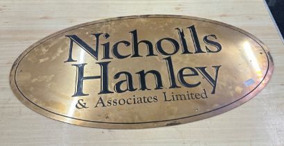 Large Nichols Hanley oval brass sign measures approximately 36 inches wide 19.5 inches tall