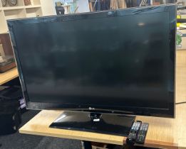 LG 52 inch flat screen TV, with remote , working order