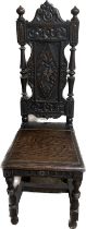 Antique heavily carved hall chair