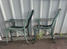 Two matching pairs of cast iron bench ends