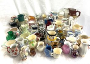 Large selection of collectable china jugs, various sizes and designs