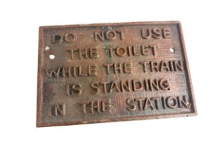 Cast iron warning sign measures approximately 11.5 inches wide 8 inches tall