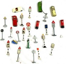 Selection of vintage toy lead road signs, badge and car