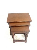 Oak nest of 3 tables largest measures approximately 18inches tall 13 inches depth