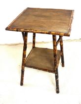 Vintage bamboo occasional table measures approximately 26 inches tall by 18.5 square