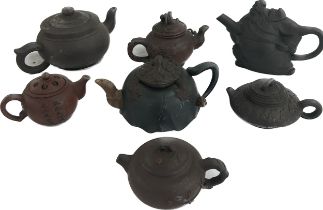 Selection of 7 oriental miniature teapots, all with makers marks to base