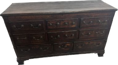 Antique house keepers chest with 6 false drawers and 3 real measures approx 35 inches tall by 60