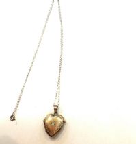 9ct gold locket pendant on a 9ct gold chain total weight 1.5 grams