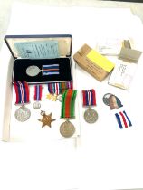 Large selection of assorted medals includes WW2, Bomber command, the defence medal etc