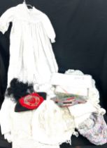 Selection of vintage linen, clothing, christening gowns etc