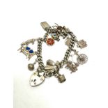 Silver charm bracelet with souvenir charms (52g)