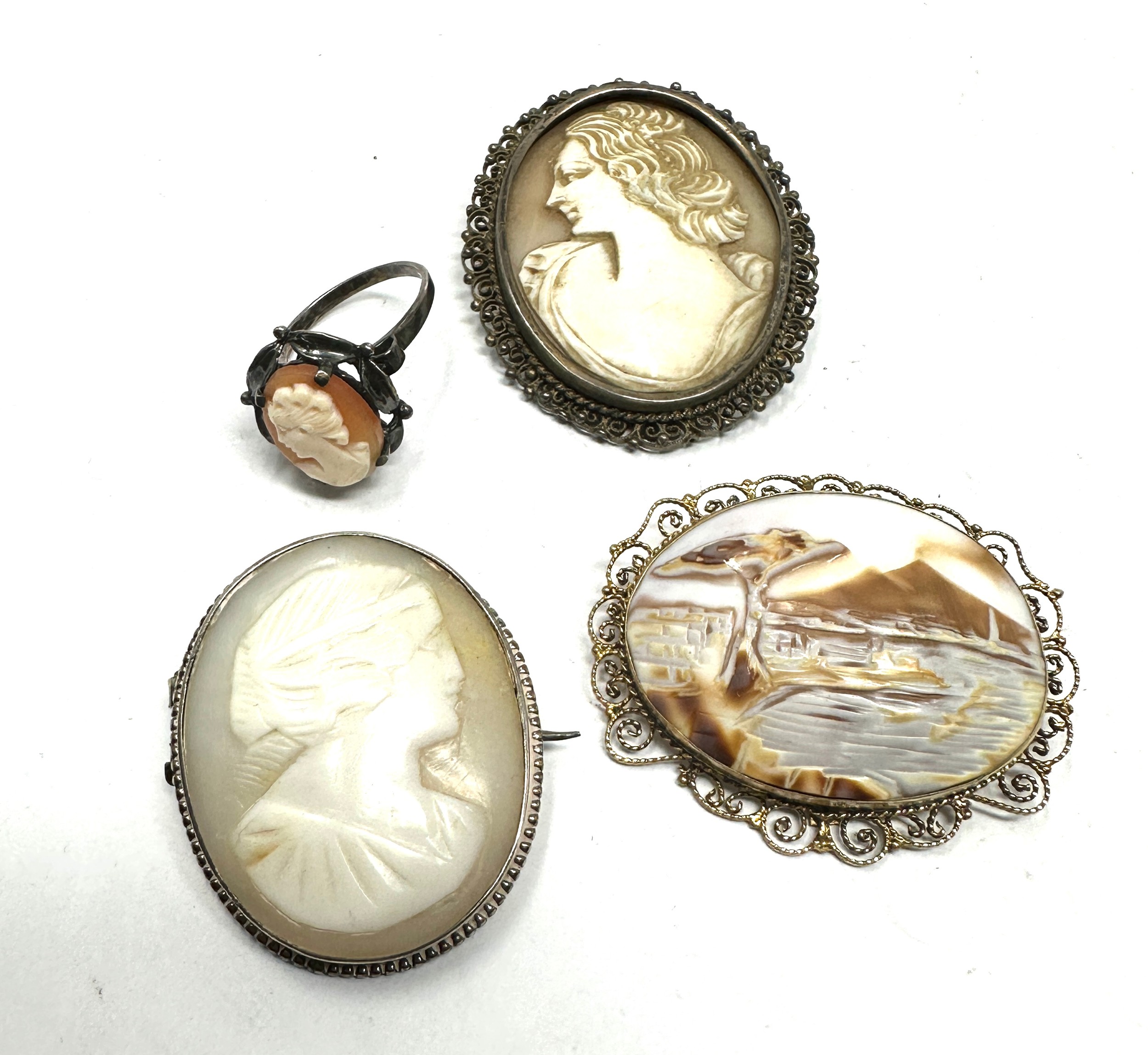 A collection of silver shell cameo jewellery including scene (29g)