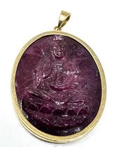 9ct gold framed ruby carved cameo weight 17g