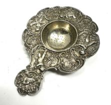 silver tea strainer / spoon