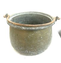 Antique brass cauldron measures approximately 15 inches wide 11 inches tall