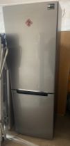 Samsung fridge freezer model measures approx: 70 inches tall by 23 wide and 25 deep