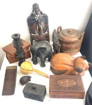 Selection of assorted wooden items includes carved wooden items, ice bucket, mask, boxes etc