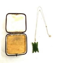 9ct gold jade chinese pendant and chain gross weight 3.7 grams, chain stamped 9ct