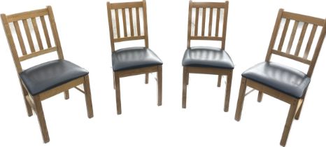 Four oak dining room chairs