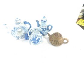 Selection of 4 Oriental tea pots includes blue and white, marks to the base etc