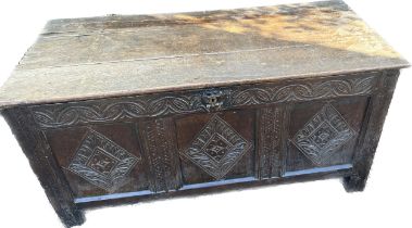 Oak carved blanket box measures approximately 24 inches tall 52 inches wide 20 inches depth