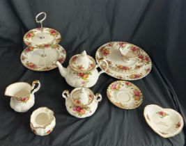 Selection of Royal Albert old country rose pottery includes tea pot sugar pot, milk jug etc