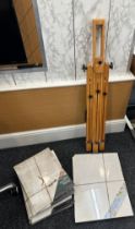 Vintage artist easel and a selection of canvases