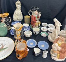 Selection of assorted pottery includes toby jugs, past time figure etc