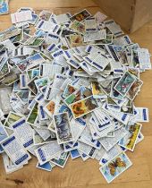 Large selection of vintage cigarette cards to include animals, transport and an assortment of stamps