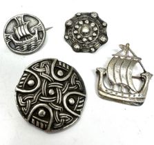 Four Scottish/Celtic silver brooches (31g)