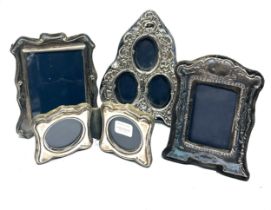 4 silver picture frames largest measures approx 14cm by 11cm