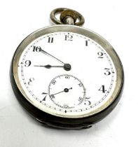 silver open face pocket watch the watch is ticking